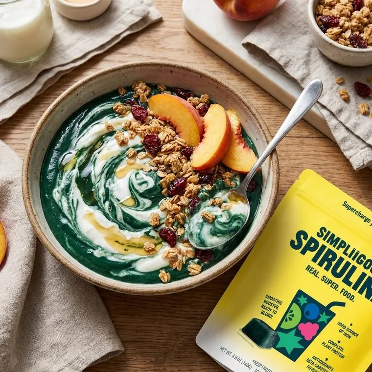 Spirulina yogurt bowl with granola and fresh berries